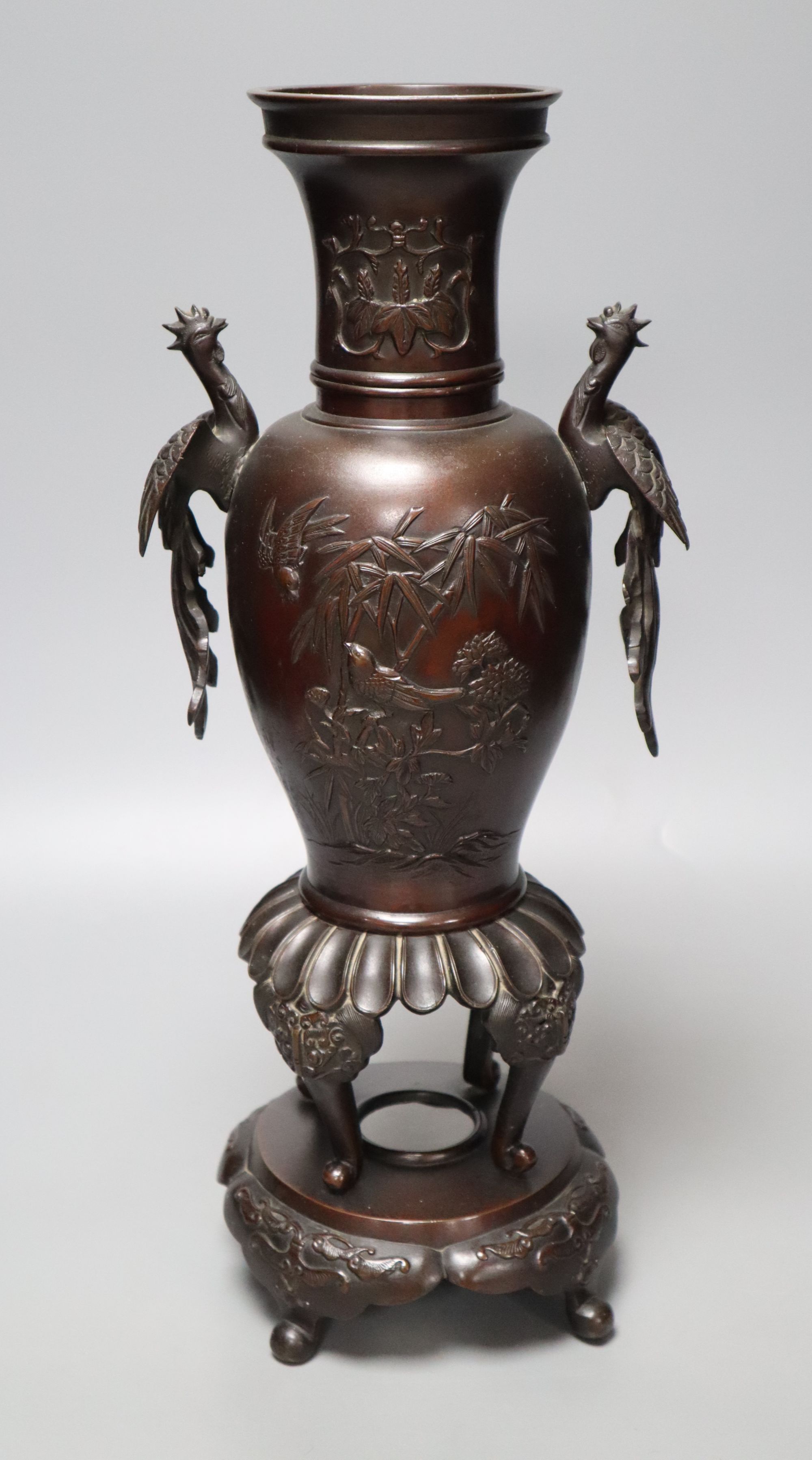 A 19th century Japanese Meiji period bronze censer vase, the handles formed as phoenix, height 41cm